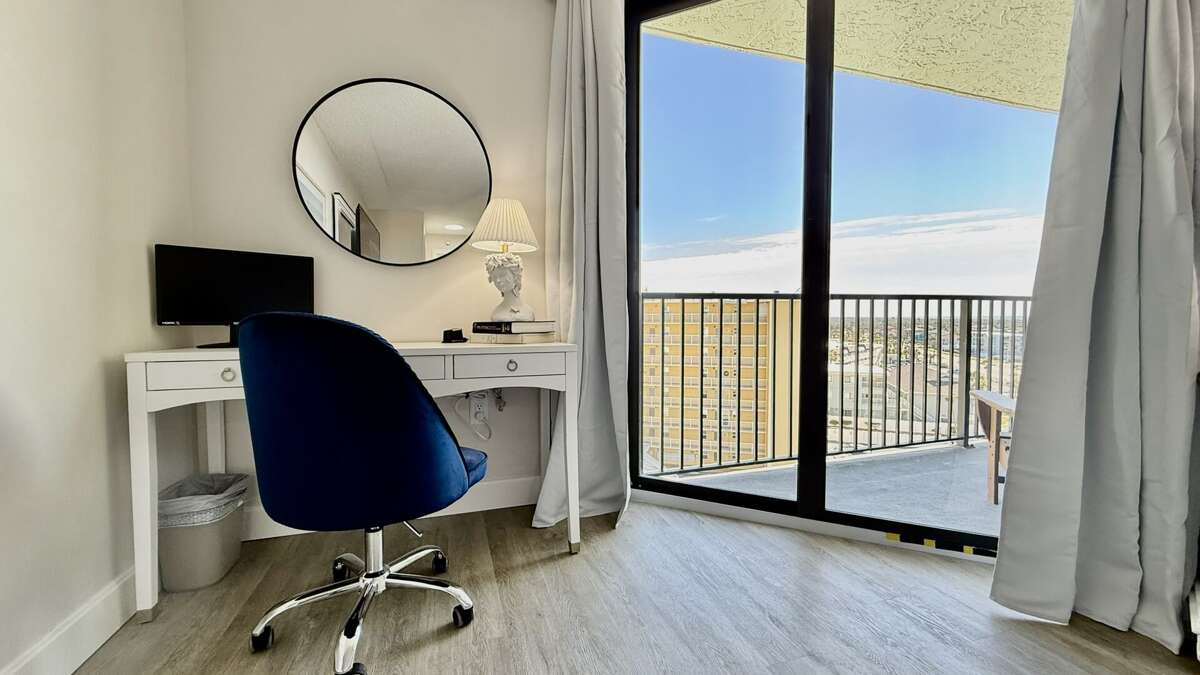 Dedicated work desk and chair with easy access to the balcony for a refreshing break when you need it Dedicated work desk and chair with easy access to the balcony for a refreshing break when you need it