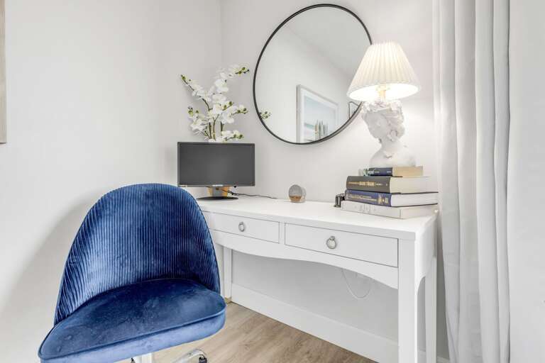 Dedicated work desk and chair with easy access to the balcony for a refreshing break when you need it