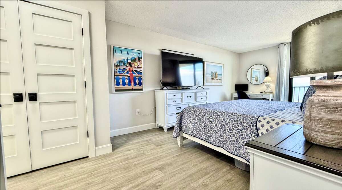 Large smart TVs in both the bedroom and living room for your entertainment throughout the condo Large smart TVs in both the bedroom and living room for your entertainment throughout the condo