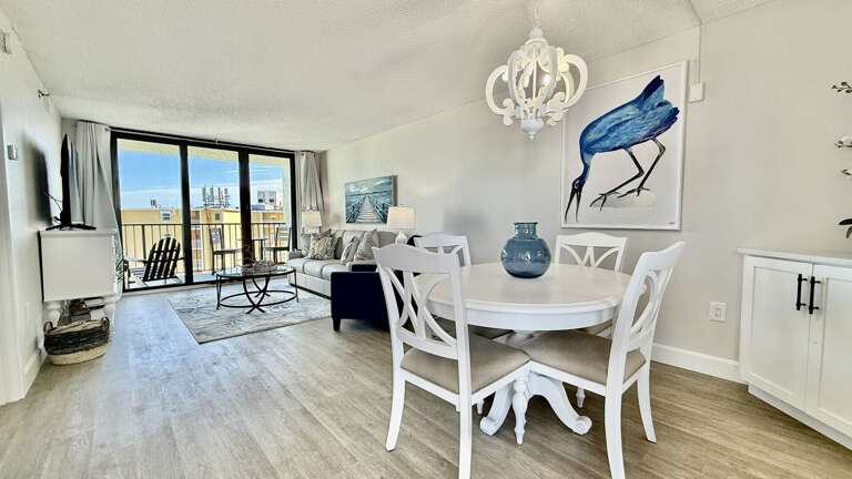 Ocean-view dining room with seating for four—perfect for meals with a view Ocean-view dining room with seating for four—perfect for meals with a view