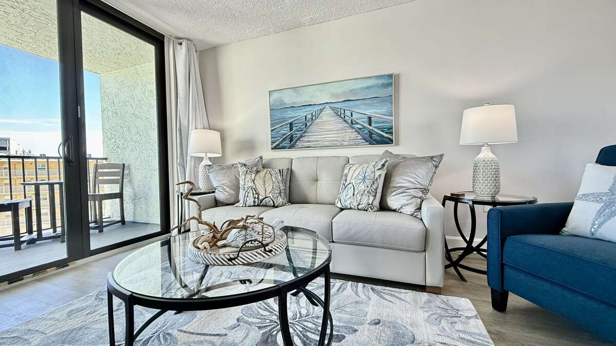 The ocean-view living room is the ideal place to unwind after a day at the beach The ocean-view living room is the ideal place to unwind after a day at the beach