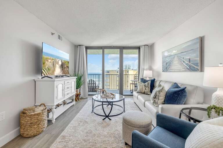 Relax in the comfortable living room with a large smart TV for your entertainment