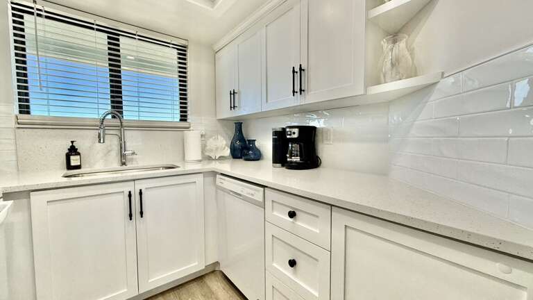 Wake up with coffee in the updated kitchen, featuring both a Keurig and a standard drip coffee maker Wake up with coffee in the updated kitchen, featuring both a Keurig and a standard drip coffee maker