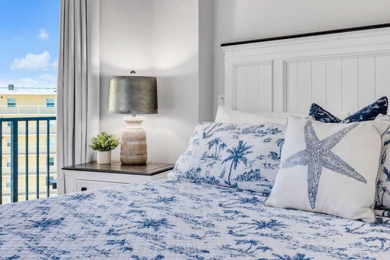 Watch the waves roll in from the comfort of your king bed in the ocean-view bedroom