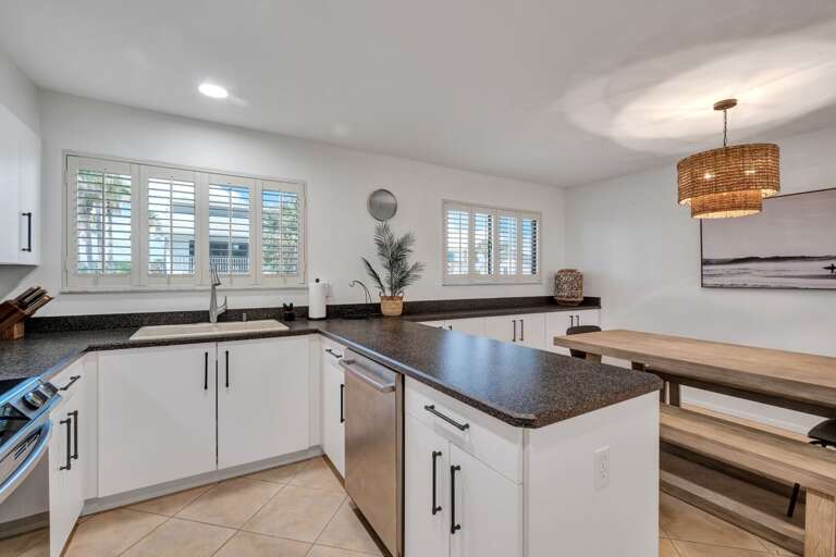 Cook and entertain effortlessly in the spacious kitchen featuring all the essentials for your culinary needs.