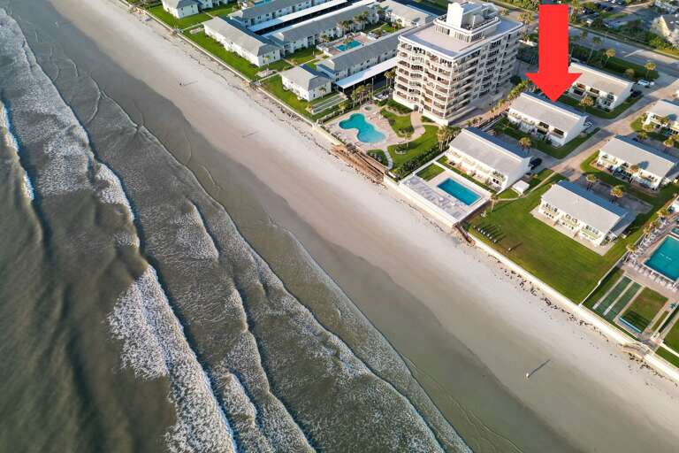 Experience unbeatable beachfront living at Oceanside Village, just steps away from the pristine sands of New Smyrna Beach!