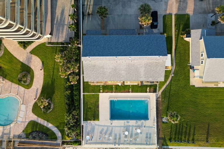 Explore the inviting grounds of Oceanside Village, where lush landscaping meets beachfront living!