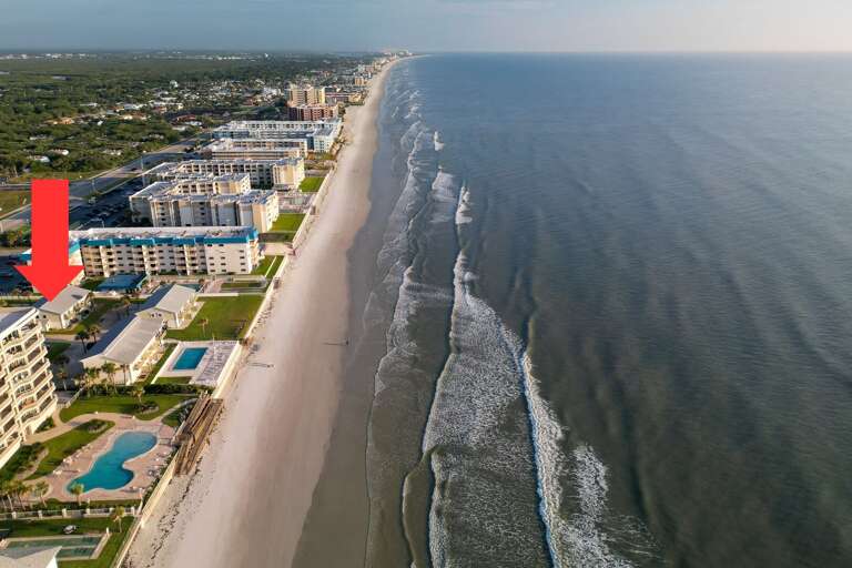 Feel the sand between your toes and enjoy the peaceful beauty of New Smyrna's no-drive beach just steps from Oceanside Village!