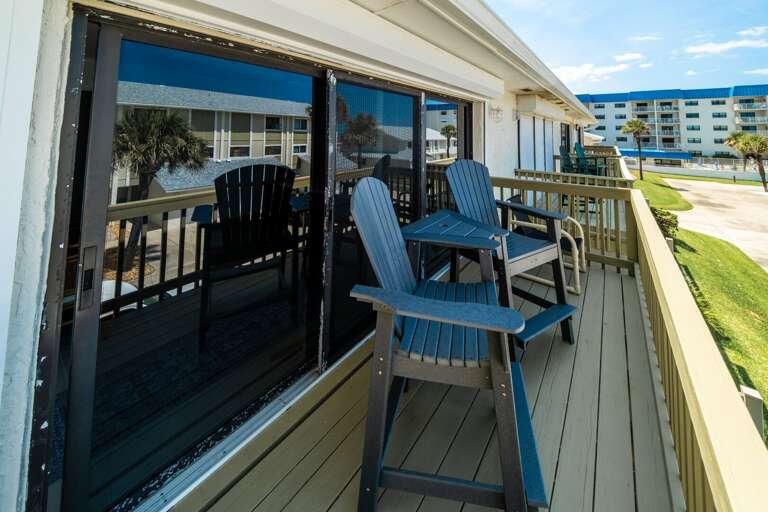 Kick back and enjoy the comfy seating on the private balcony - perfect for morning coffee or sunrise views.