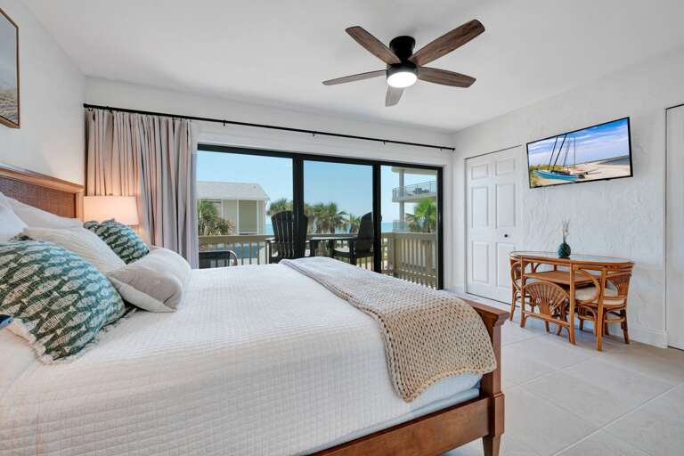 Relax in the king-size master bedroom with your own private balcony offering serene views. Relax in the king-size master bedroom with your own private balcony offering serene views.