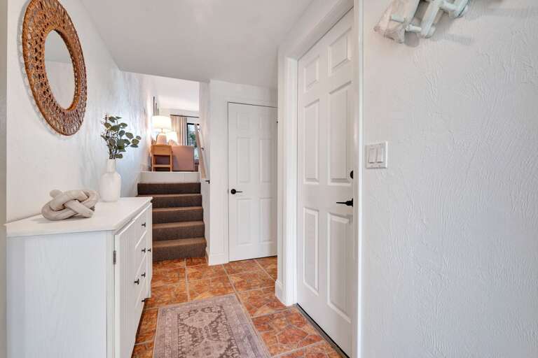 Step inside and feel right at home in the welcoming entryway of your Oceanside Village condo.