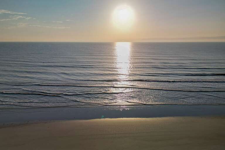 Wake up to a breathtaking sunrise over the Atlantic Ocean, a perfect start to your day at Oceanside Village.