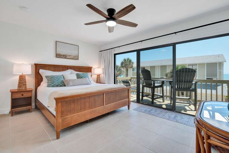 Wake up to beach views and step out onto your private balcony from the master bedroom's king bed.