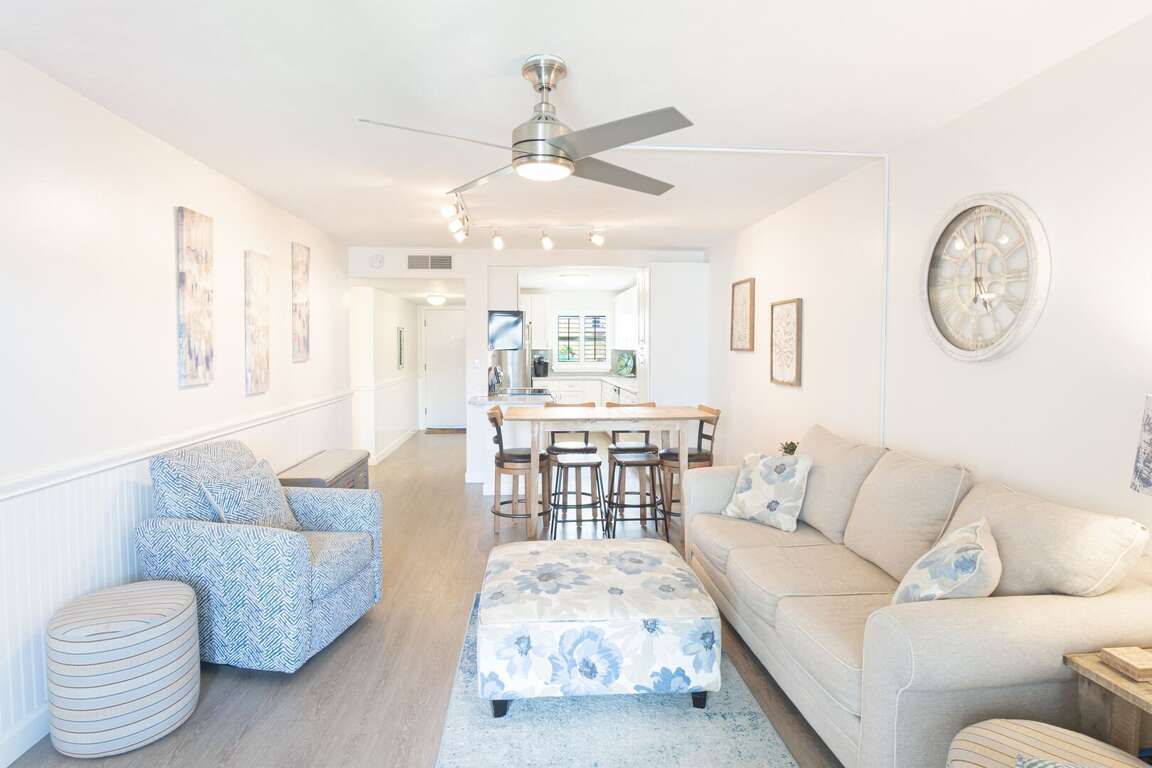 Bright and spacious living room with ample seating, perfect for hosting all your guests in comfort Bright and spacious living room with ample seating, perfect for hosting all your guests in comfort