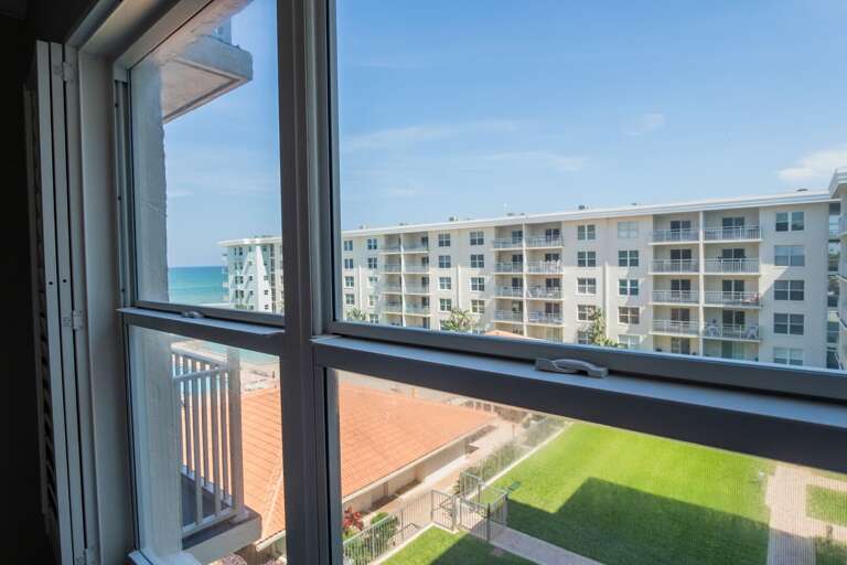 Enjoy views of the Atlantic Ocean and Sea Coast Gardens pool right from the master bedroom window Enjoy views of the Atlantic Ocean and Sea Coast Gardens pool right from the master bedroom window