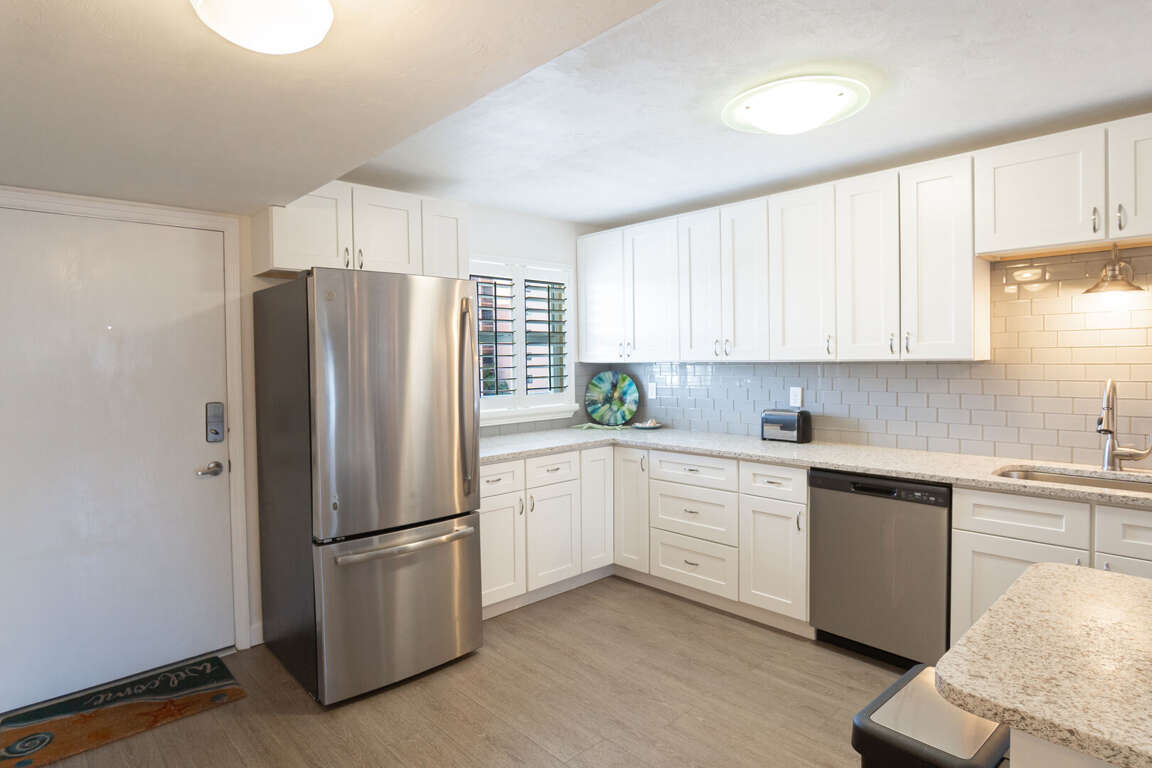 Modern, updated kitchen featuring sleek stainless steel appliances Modern, updated kitchen featuring sleek stainless steel appliances