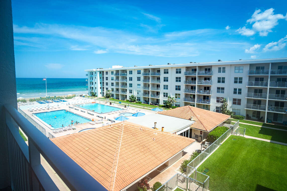 Welcome to Sea Coast Gardens II 414! Take in stunning pool and beach views from your private 4th-floor balcony Welcome to Sea Coast Gardens II 414! Take in stunning pool and beach views from your private 4th-floor balcony