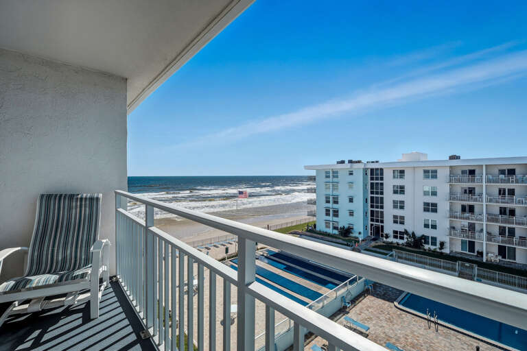 Enjoy breathtaking views from the private 5th-floor balcony, overlooking the pool deck, shuffleboard courts, and serene no-drive New Smyrna Beach Enjoy breathtaking views from the private 5th-floor balcony, overlooking the pool deck, shuffleboard courts, and serene no-drive New Smyrna Beach