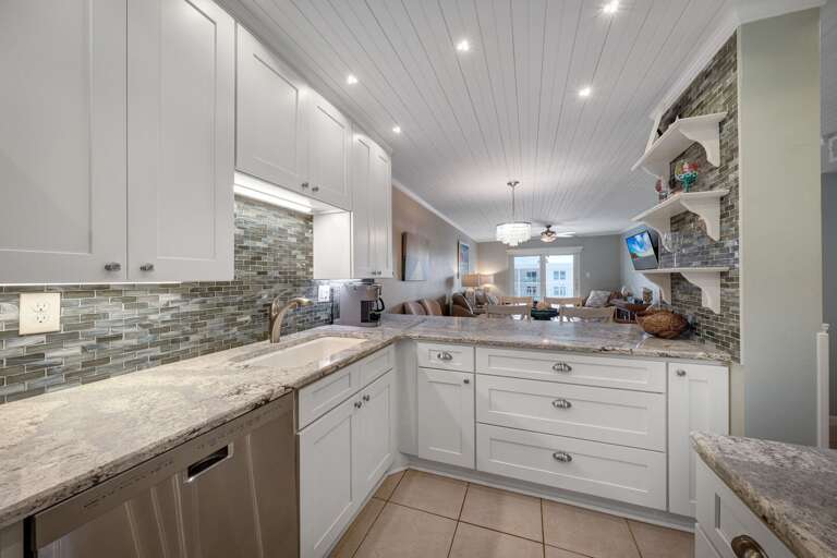 Enjoy the convenience of the fully-equipped kitchen, offering everything you need for your stay in New Smyrna Beach Enjoy the convenience of the fully-equipped kitchen, offering everything you need for your stay in New Smyrna Beach