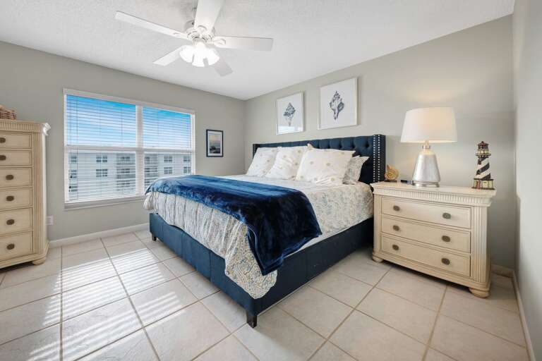 Wake up to Atlantic Ocean views in the master bedroom of Sea Coast Gardens II 508, featuring a luxurious king bed and a scenic overlook of the Sea Coast Gardens pool deck Wake up to Atlantic Ocean views in the master bedroom of Sea Coast Gardens II 508, featuring a luxurious king bed and a scenic overlook of the Sea Coast Gardens pool deck