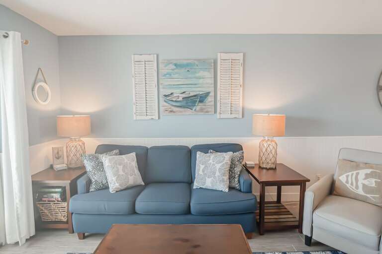 Comfortable couch with beach decor Comfortable couch with beach decor