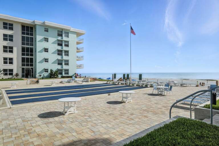 Challenge friends to a game on the oceanfront shuffleboard courts with stunning beach views.