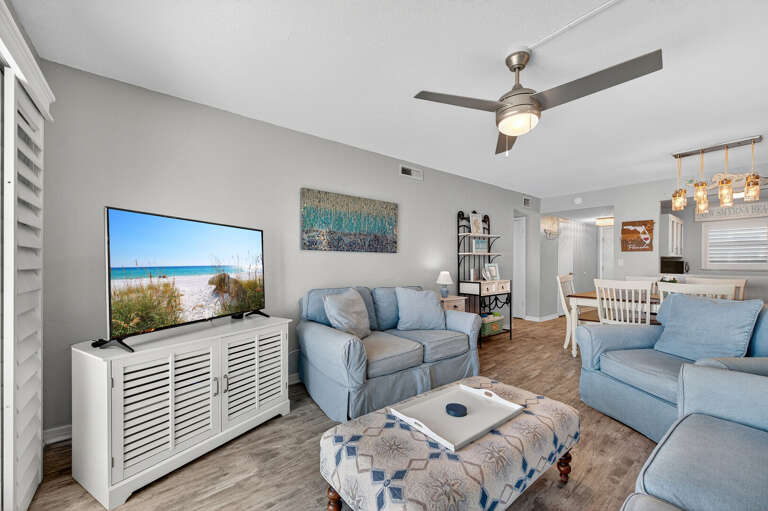 Comfort meets convenience with a spacious living room featuring a sleeper sofa for extra guests.