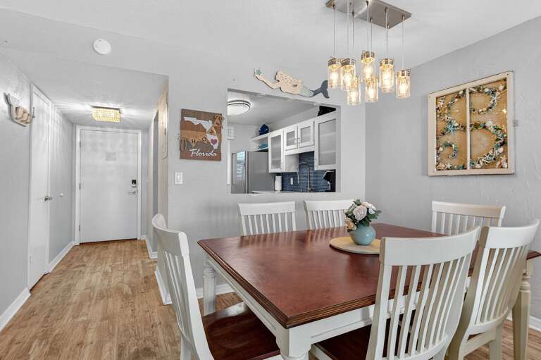 Enjoy a seamless flow from the dining room to the fully equipped kitchen - perfect for beachside meals and entertaining.