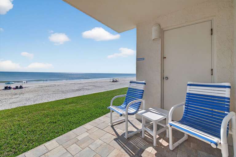 Welcome to Sea Coast Gardens III 104 - your direct oceanfront retreat on no-drive New Smyrna Beach, with an open first-floor patio just steps from the sand! Welcome to Sea Coast Gardens III 104 - your direct oceanfront retreat on no-drive New Smyrna Beach, with an open first-floor patio just steps from the sand!