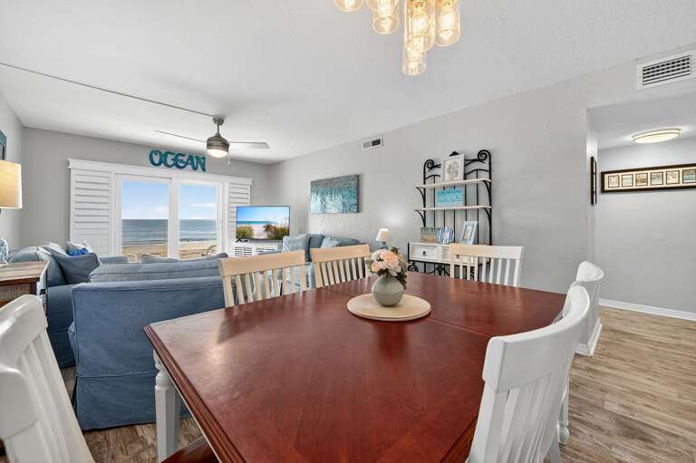 Soak in unobstructed beach views from the open dining and living area-coastal comfort at its best.