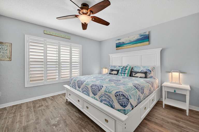 Wake up to stunning ocean views in the spacious master bedroom with a king-sized bed.