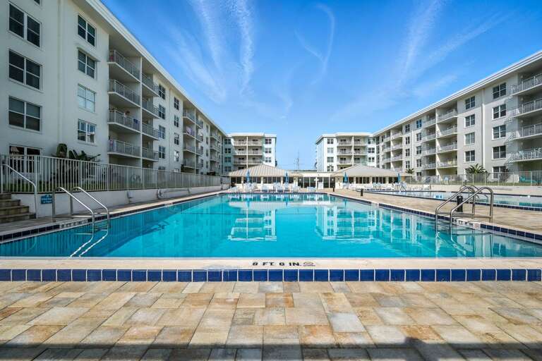 Take a dip in the beachfront pool, with one pool seasonally heated for year-round enjoyment Take a dip in the beachfront pool, with one pool seasonally heated for year-round enjoyment