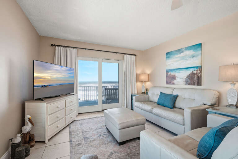 Enjoy breathtaking corner views from this 3rd-floor oceanfront living room, where the beauty of New Smyrna Beach and the tranquil surroundings combine for the ultimate beach getaway Enjoy breathtaking corner views from this 3rd-floor oceanfront living room, where the beauty of New Smyrna Beach and the tranquil surroundings combine for the ultimate beach getaway