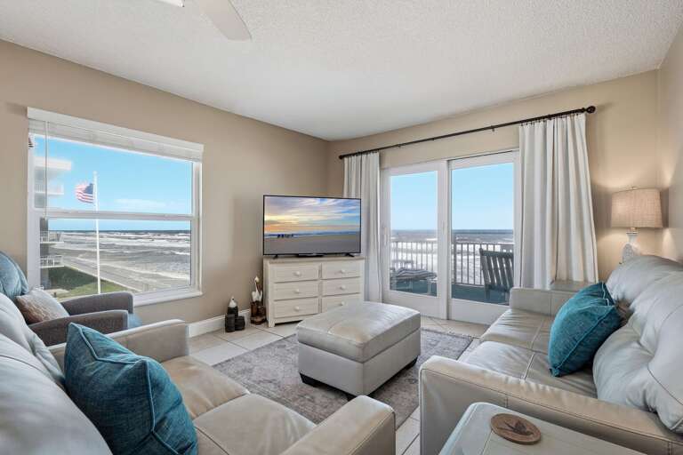 Enjoy breathtaking views of New Smyrna Beach and the Sea Coast Gardens pool right from the oceanfront living room of this beautiful corner condo Enjoy breathtaking views of New Smyrna Beach and the Sea Coast Gardens pool right from the oceanfront living room of this beautiful corner condo