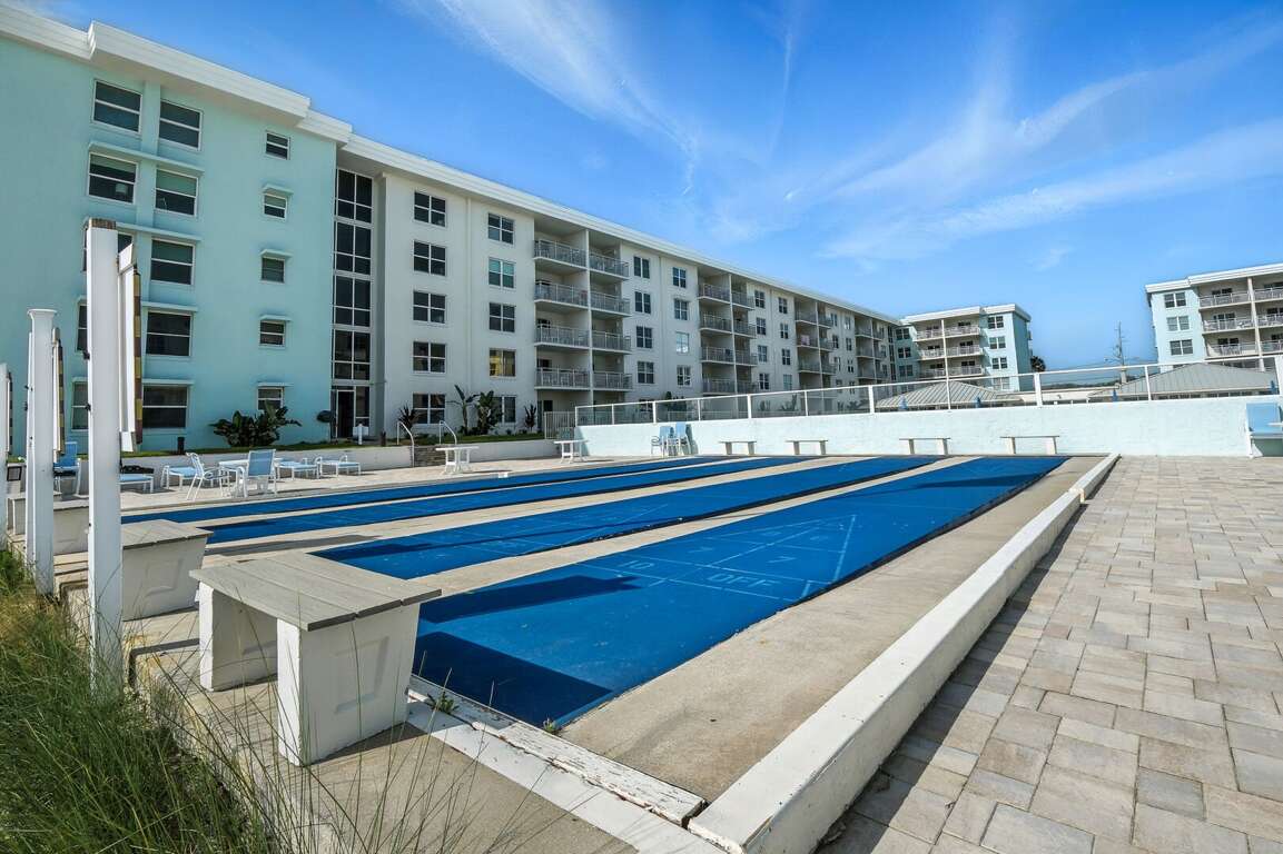Enjoy a perfect view of the pool and shuffleboard courts from the corner balcony Enjoy a perfect view of the pool and shuffleboard courts from the corner balcony