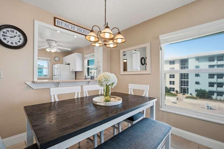 Gather around the dining table with seating for 6, perfect for enjoying meals and making vacation memories Gather around the dining table with seating for 6, perfect for enjoying meals and making vacation memories