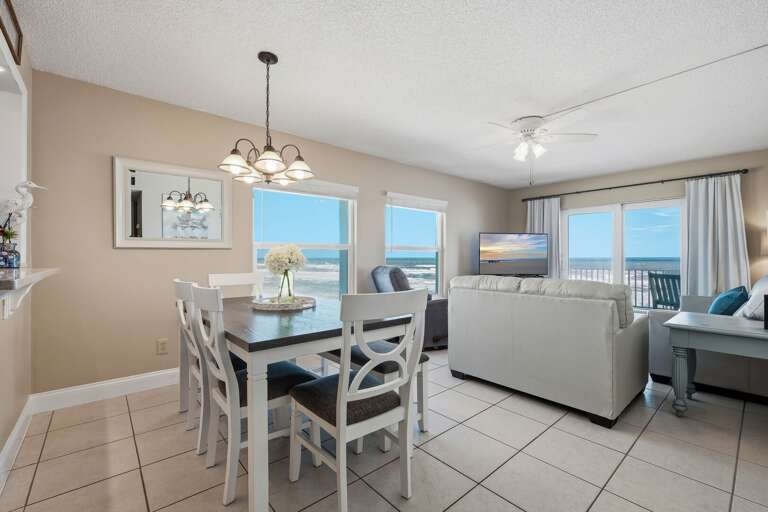 Indulge in oceanfront dining with seating for six at this stylish dining room, offering a perfect corner view of both the pool and the beach Indulge in oceanfront dining with seating for six at this stylish dining room, offering a perfect corner view of both the pool and the beach