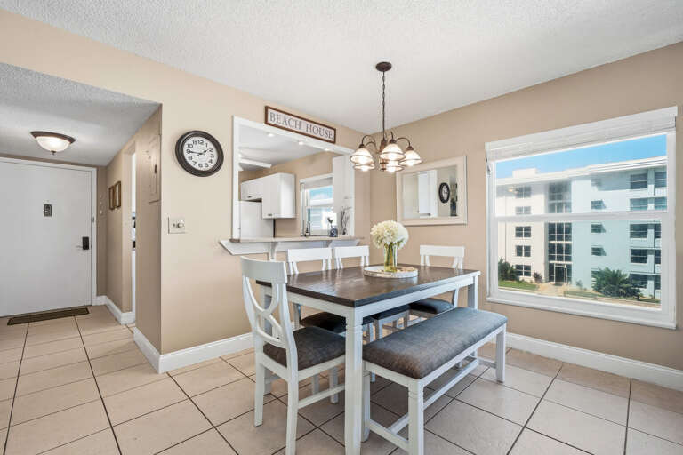 Sunlit and inviting, the bright oceanfront dining room offers a stunning pool view from its charming corner window Sunlit and inviting, the bright oceanfront dining room offers a stunning pool view from its charming corner window