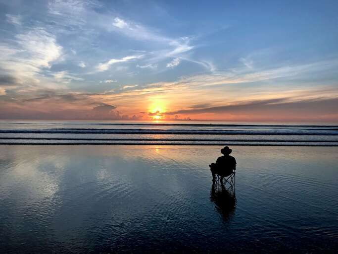 Wake up to the stunning east coast sunrises over the Atlantic, casting vibrant colors across the sky and the tranquil waters of New Smyrna Beach Wake up to the stunning east coast sunrises over the Atlantic, casting vibrant colors across the sky and the tranquil waters of New Smyrna Beach