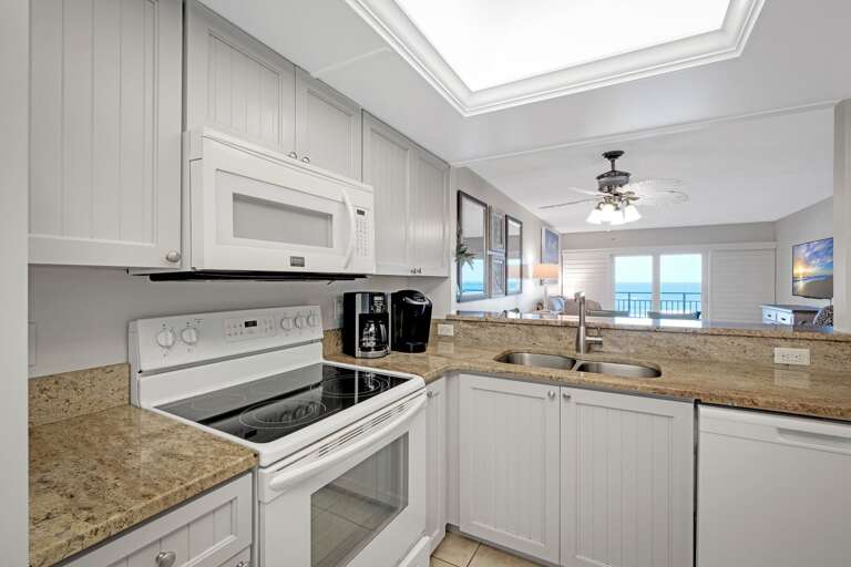 Cook in style with granite countertops and enjoy stunning ocean views right from the kitchen Cook in style with granite countertops and enjoy stunning ocean views right from the kitchen