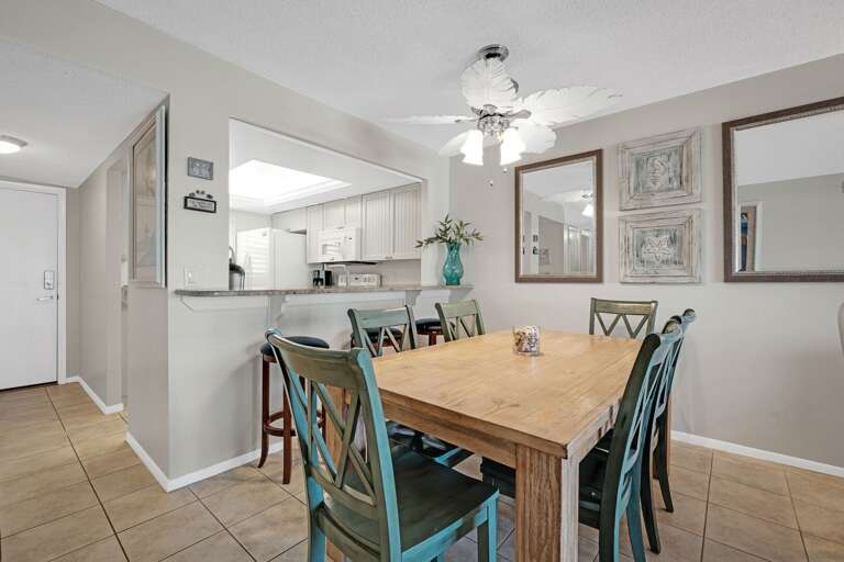 Dine in style with seating for 6 and 3 extra barstools, perfectly set against the backdrop of breathtaking Atlantic Ocean views