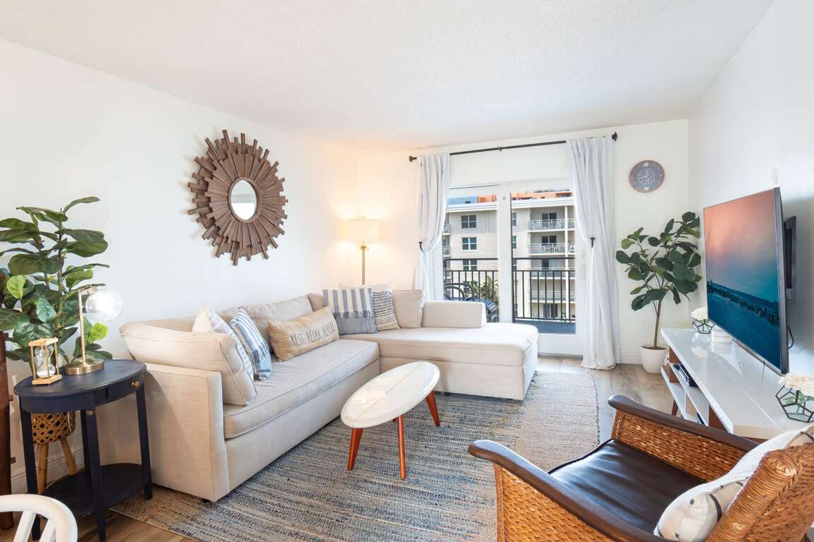 Enjoy the beautiful New Smyrna Beach from unit 407's spacious living room. Enjoy the beautiful New Smyrna Beach from unit 407's spacious living room.