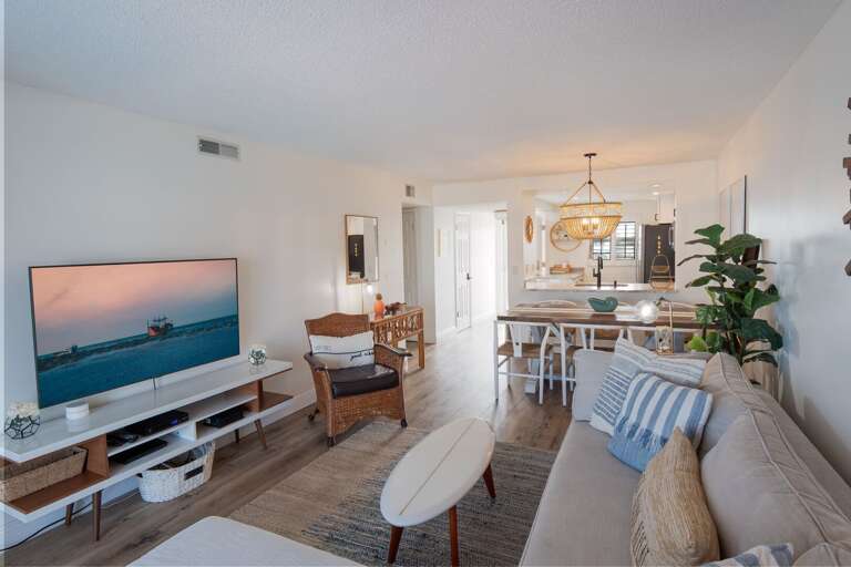 This open concept living space is perfect for families. This open concept living space is perfect for families.