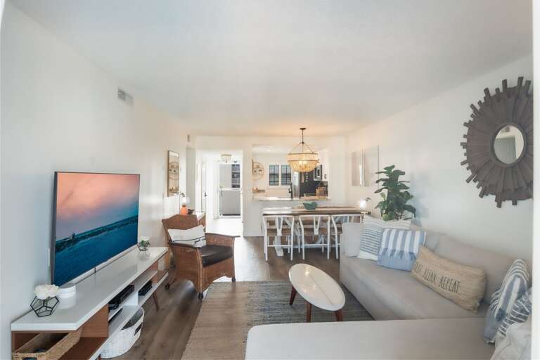 A spacious living room with seating for everyone. A spacious living room with seating for everyone.