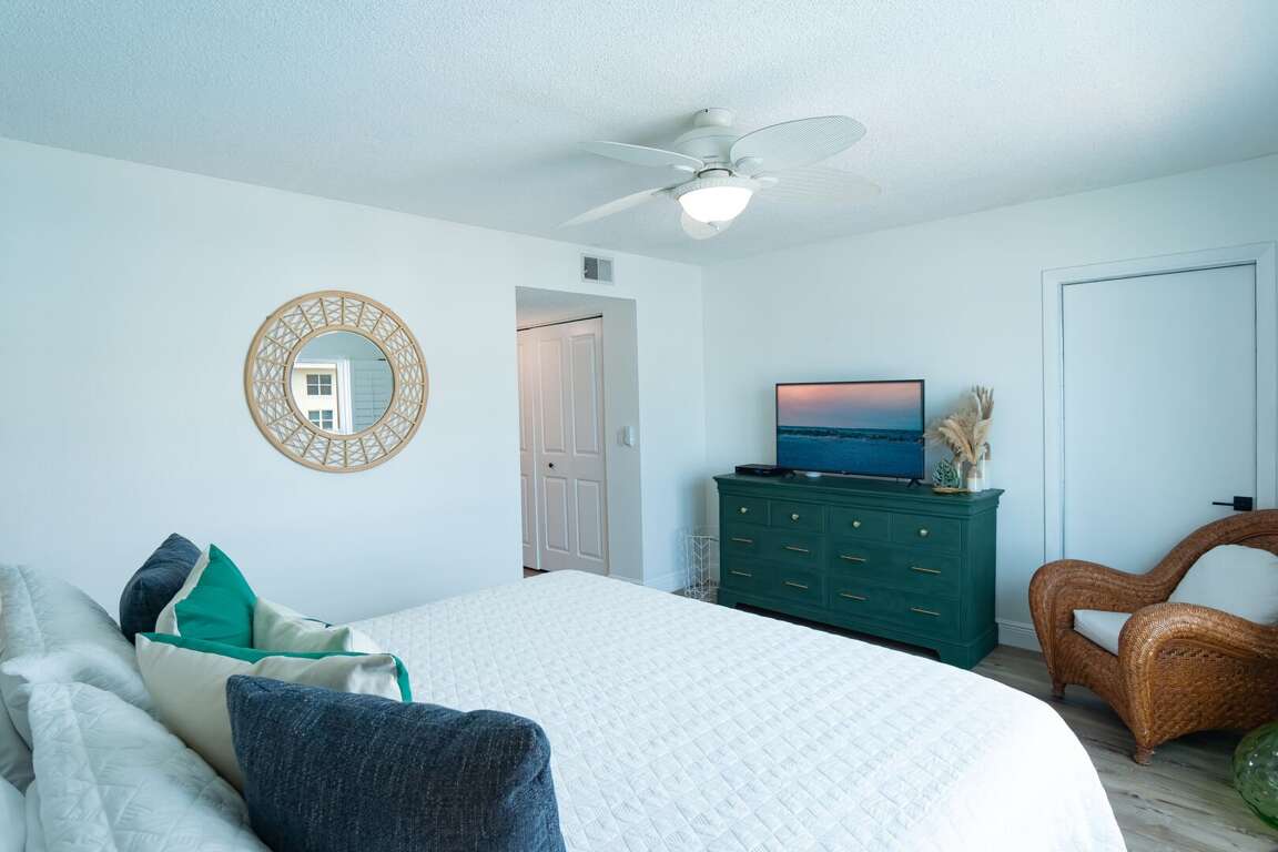 TV in the master bedroom allows guests to catch up on their favorite shows. TV in the master bedroom allows guests to catch up on their favorite shows.