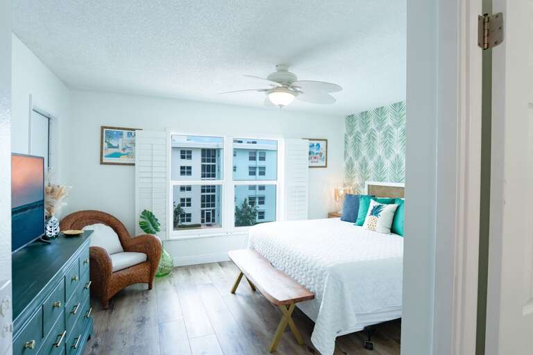 Walk into this welcoming master bedroom with beach and pool views. Walk into this welcoming master bedroom with beach and pool views.