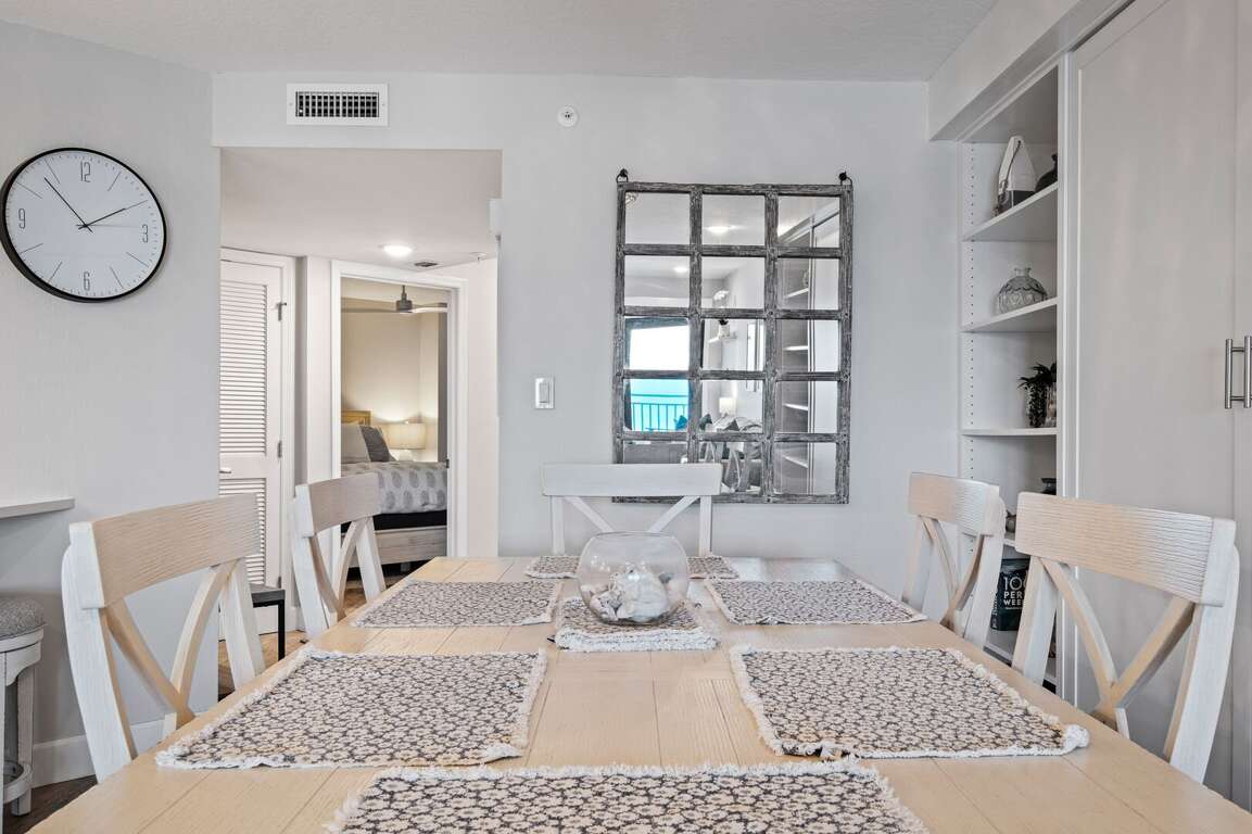 Gather around the stylish dining room table for a meal or conversation Gather around the stylish dining room table for a meal or conversation