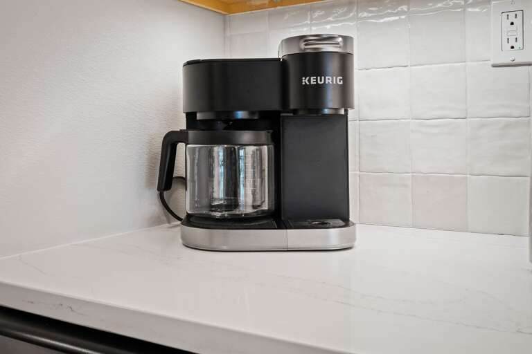 The kitchen includes both a standard drip coffee maker and a Keurig The kitchen includes both a standard drip coffee maker and a Keurig