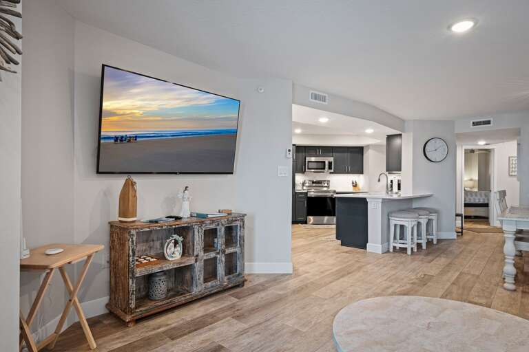 The living room features a big TV for your entertainment The living room features a big TV for your entertainment