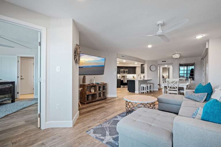 The living room features a large TV for your entertainment The living room features a large TV for your entertainment